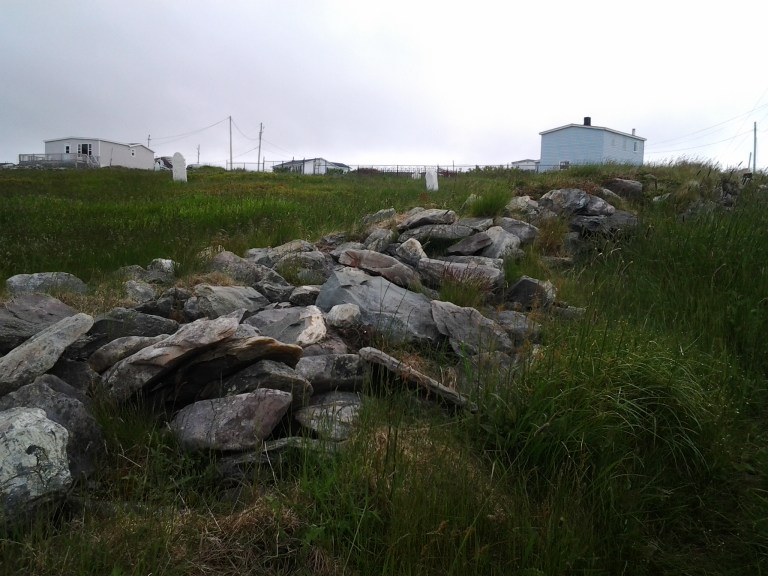 Rock wall across the road from our two story rental, Grates Cove Studio, Grates Cove, NL