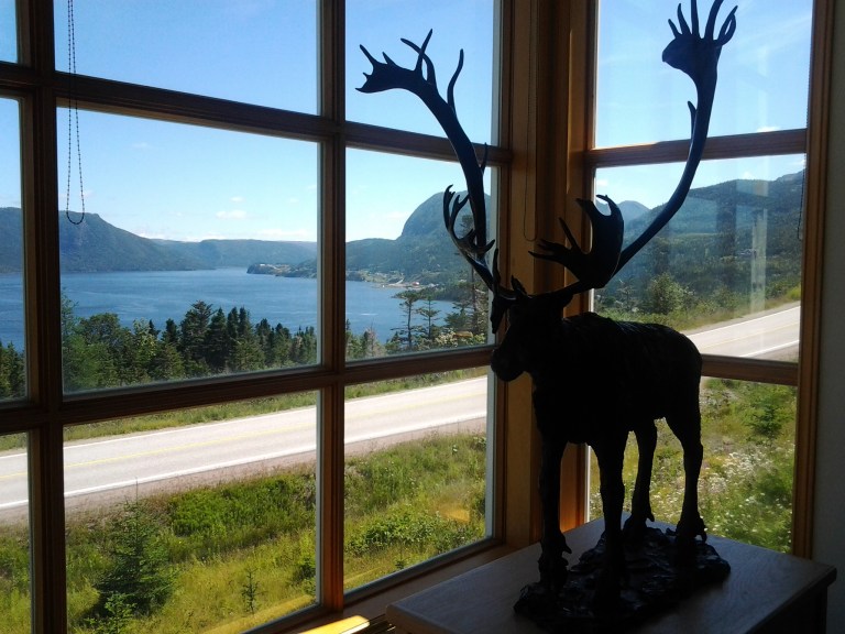 Caribou Statue and beautiful Bonne Bay, Woody Point Interpretation Centre, Gros Morne National Park, NL