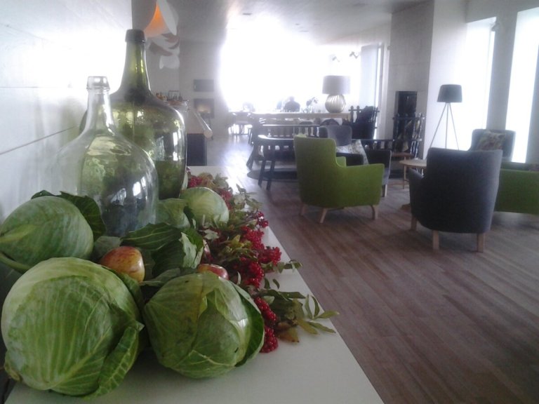 Harvest decorations at the Fogo Island Inn. Locally grown vegetables and berries that compliment locally made chairs and furniture.