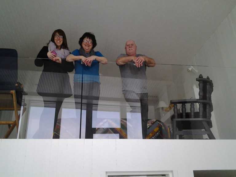 Island Harbour crowd admiring the view from the loft, Room 28, Fogo Island Inn