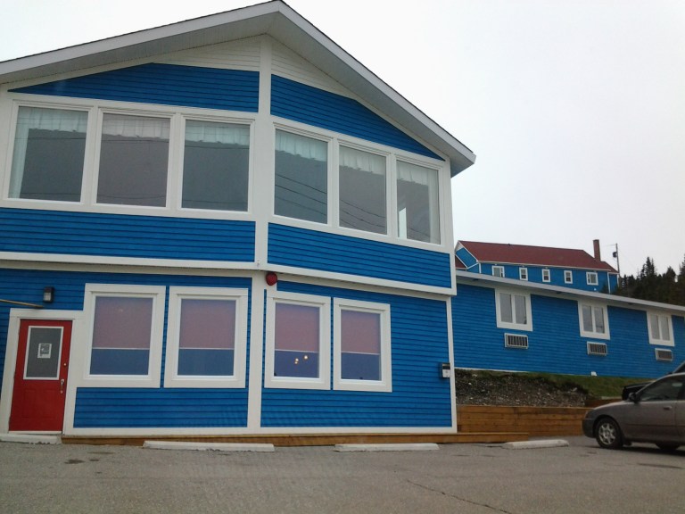 We'd seen renovations over the past few years but the large building on the hill to the right now contains new efficiency units. One and two bedroom units are available. Anchor Inn, Twillingate, NL May 2014