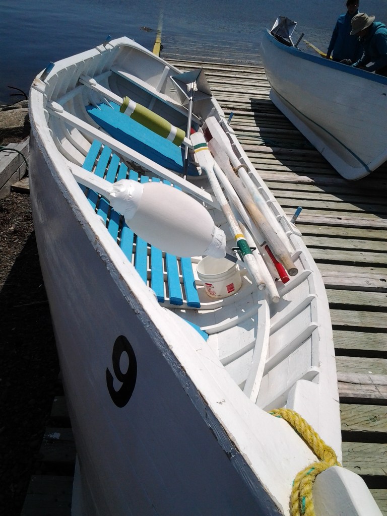 Lillian Dwyer gave up the pillow from her bed for husband Clem. Punt padding. It's not just a test of the arms and shoulders. Fogo Island Punt Race 2014