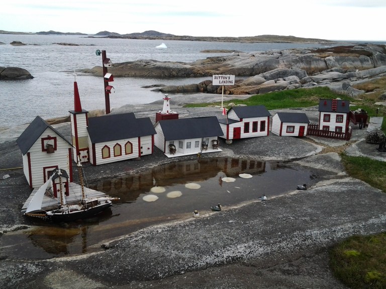 Miniature village with icebergs in the background. Greenspond, NL May 31, 2015
