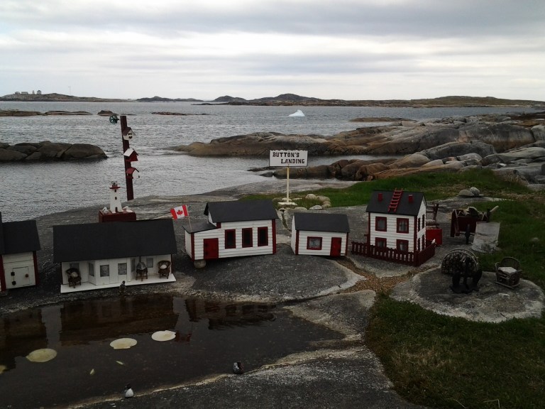 Miniature village with icebergs in the background. Greenspond, NL May 31, 2015